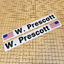Two decals sitting side by side that read W Prescott with United States flags. thumbnail